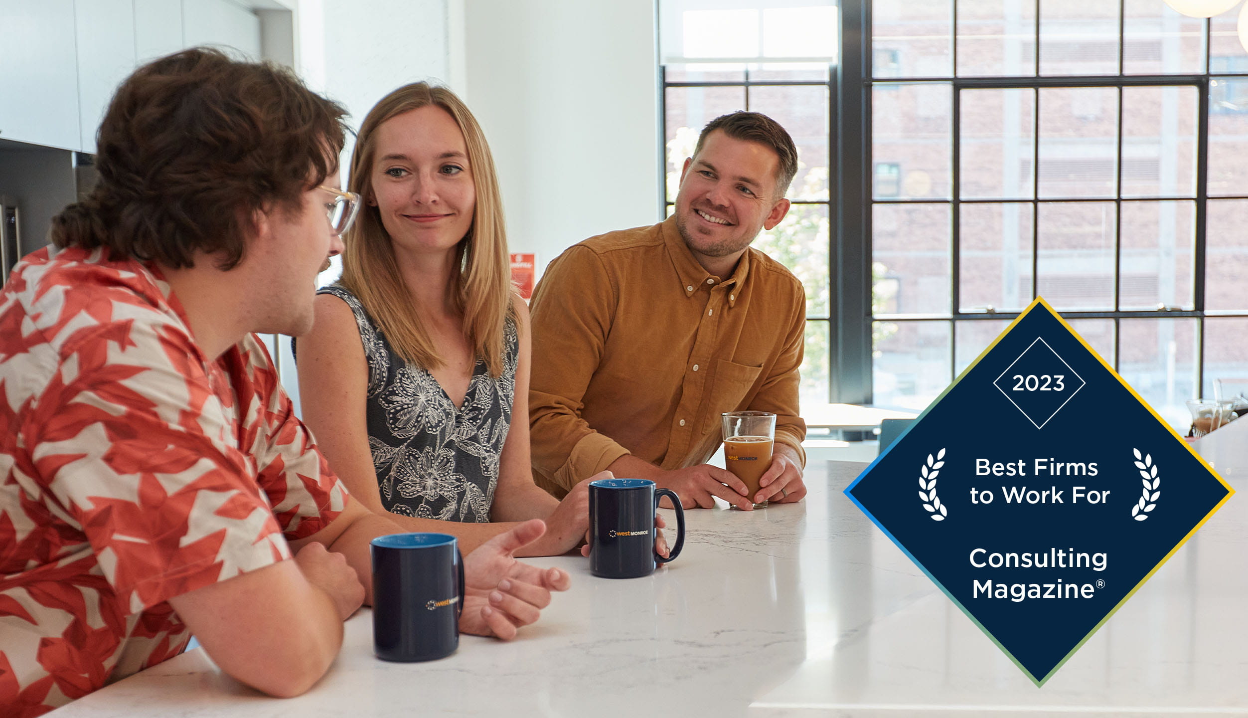 Coworkers drinking coffee together with award badge in corner