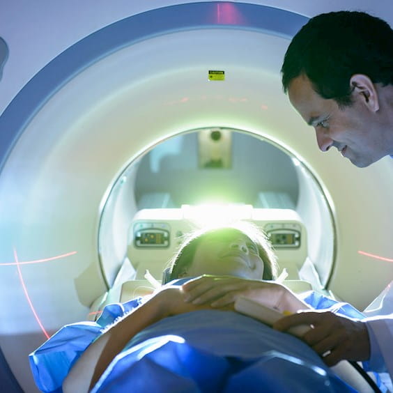 medical professional consulting a patient before going into an mri machine