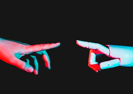 hand and robotic hand