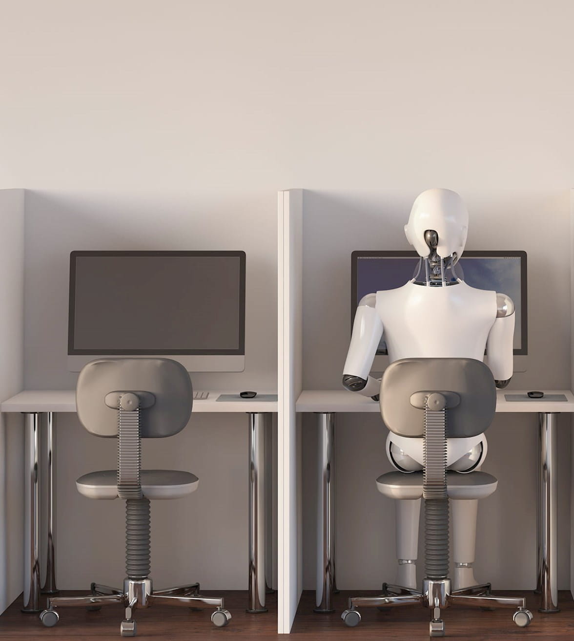 robot sitting at a computer station