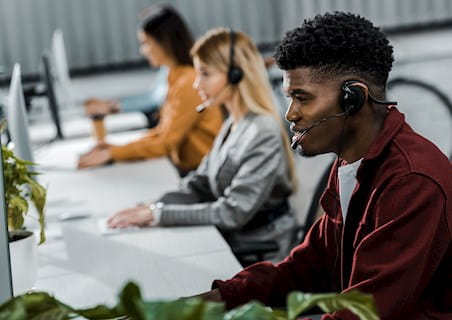 employees with headsets on